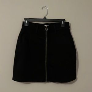 Black zip up skirt. Only worn once.